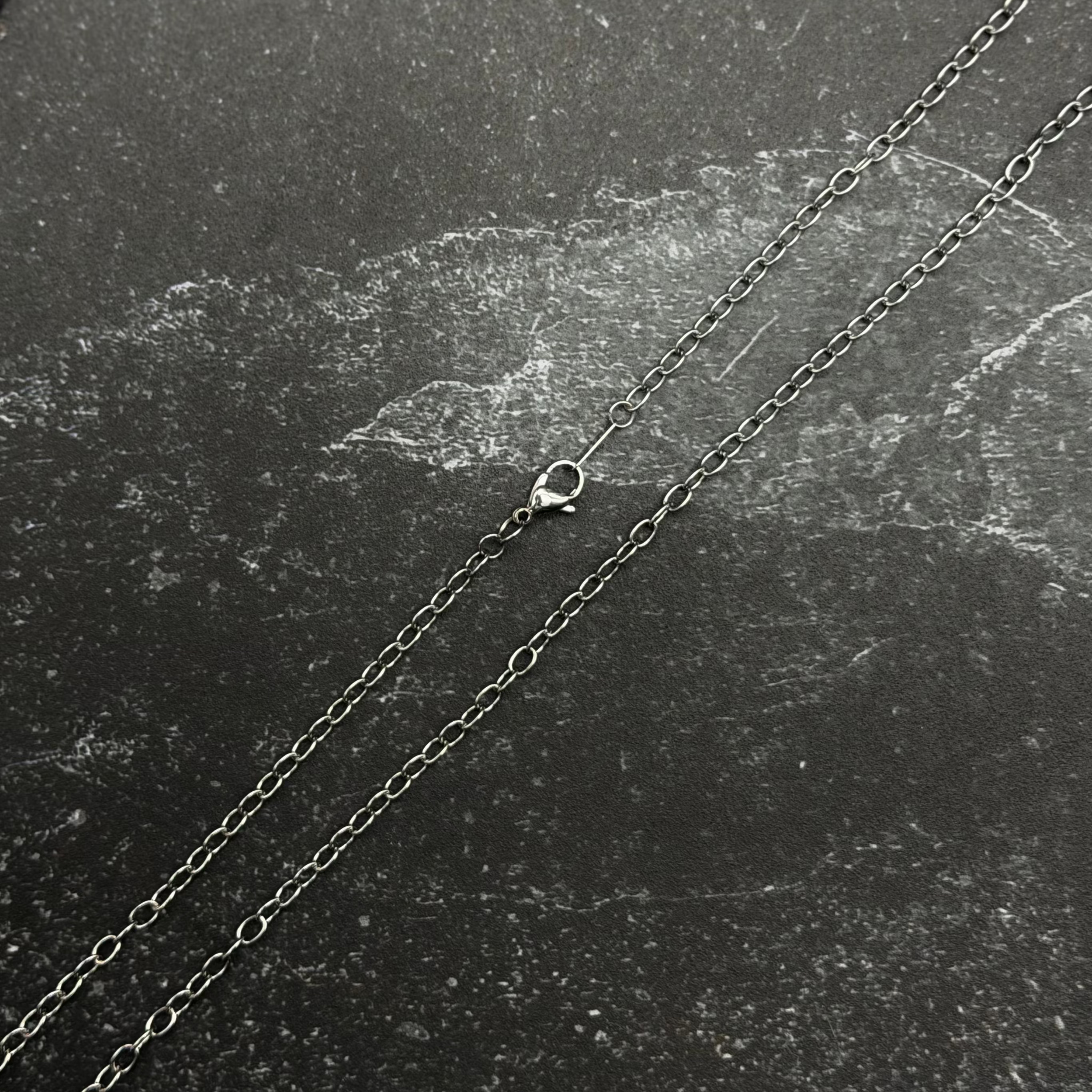 Stainless steel chain with lobster clasp.