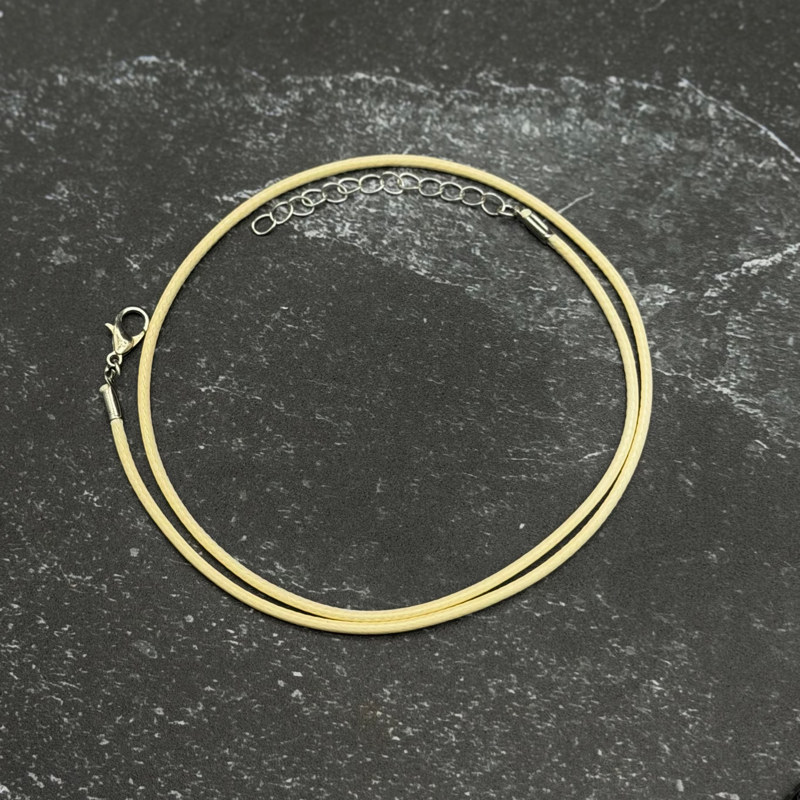 Cream leather wax cord necklace with chain extender. 