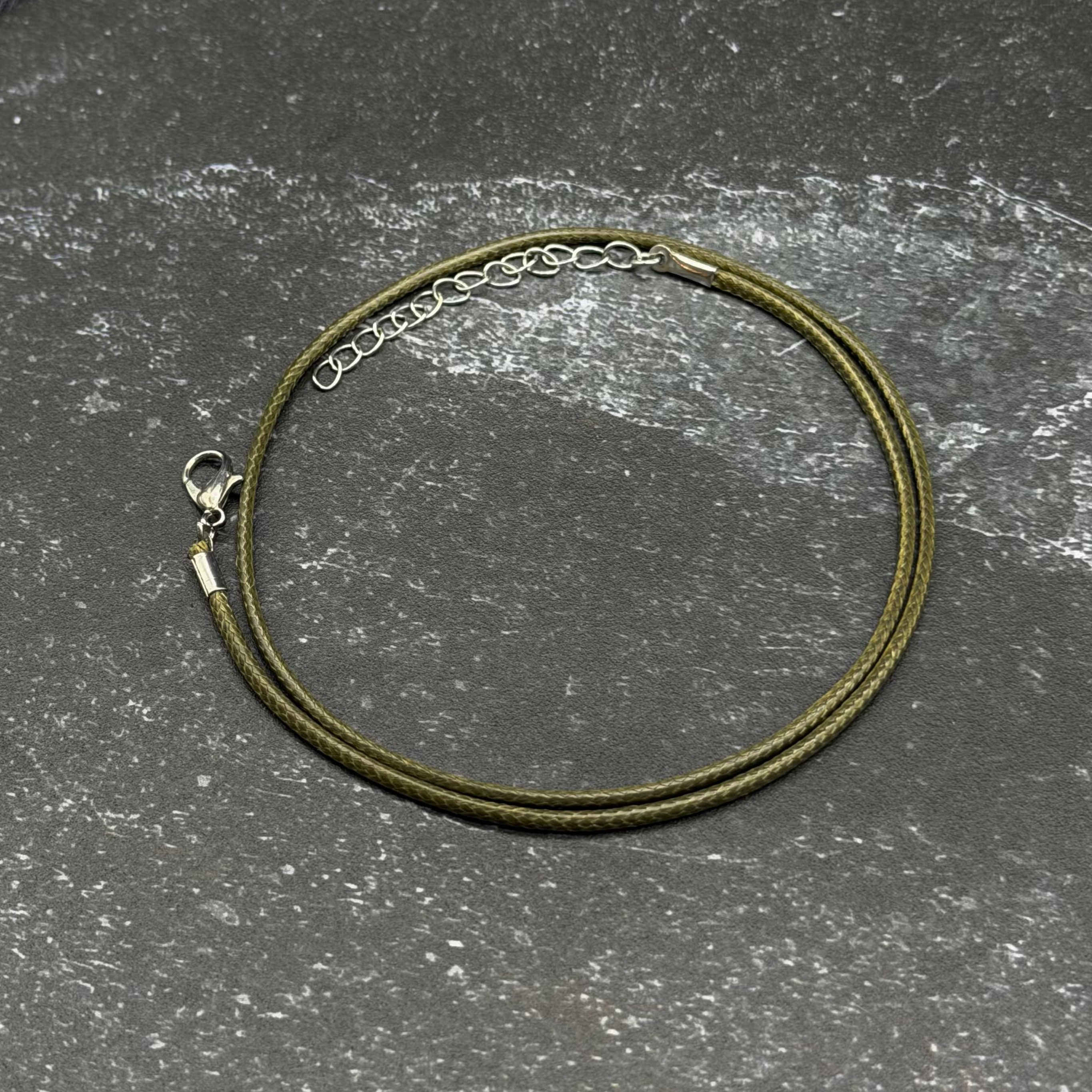 Green leather wax cord necklace with chain extender. 