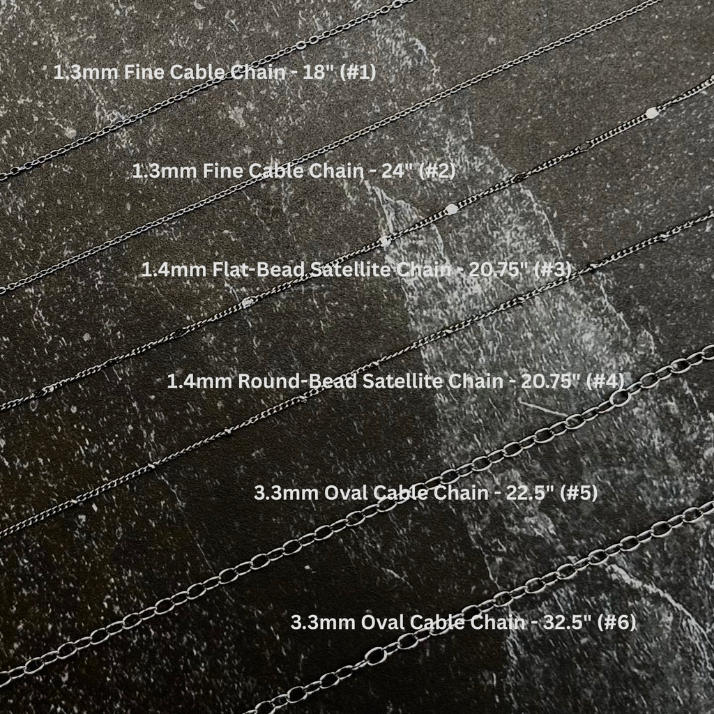 Labeled Stainless Steel Chains on Slate